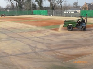 6 tonne of sand being added to the clean carpet